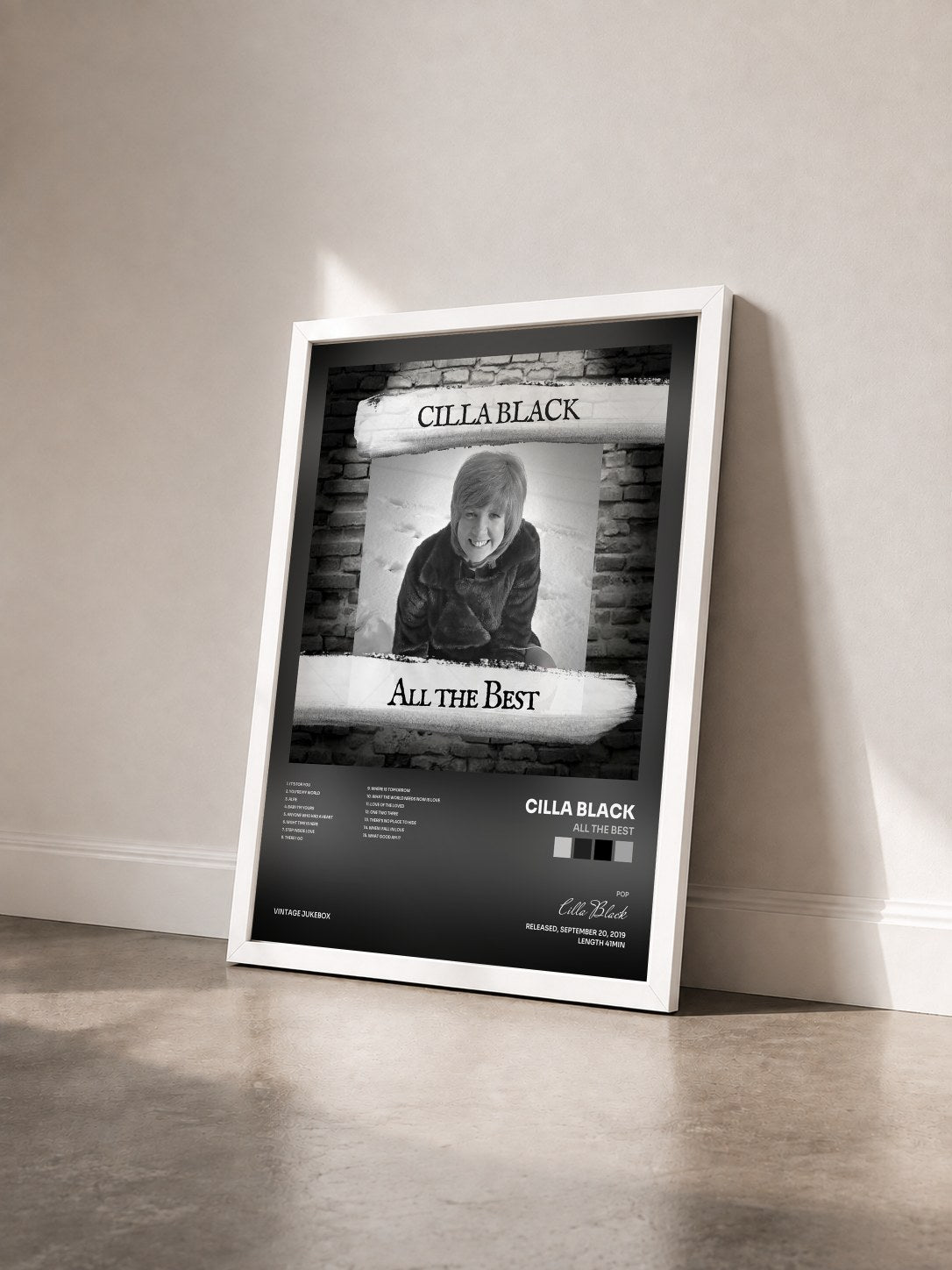 #blanc Tableau de l'album All The Best de Cilla Black vu de trois quarts, cadre blanc
