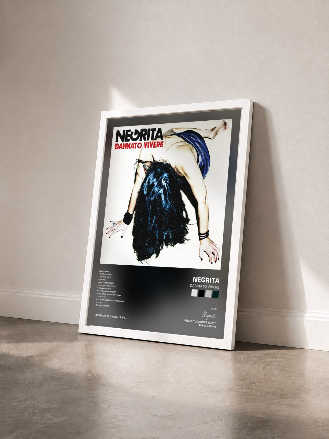 #blanc Tableau de l'album Dannato Vivere de Negrita vu de trois quarts, cadre blanc
