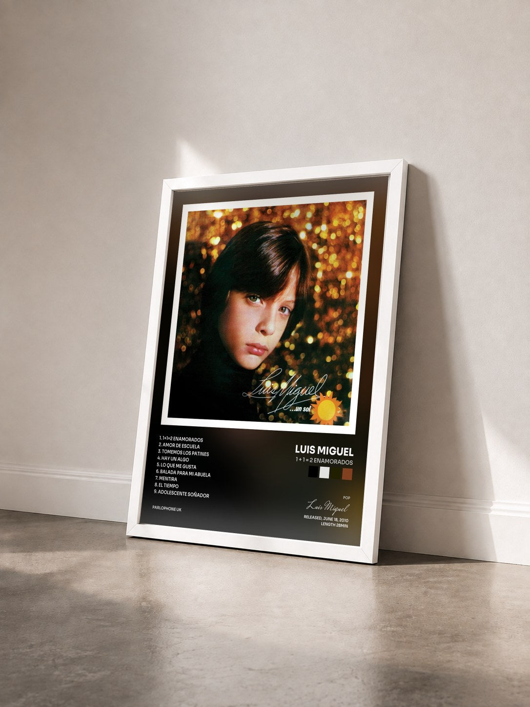 #blanc Tableau de l'album 1 + 1 = 2 Enamorados de Luis Miguel vu de trois quarts, cadre blanc