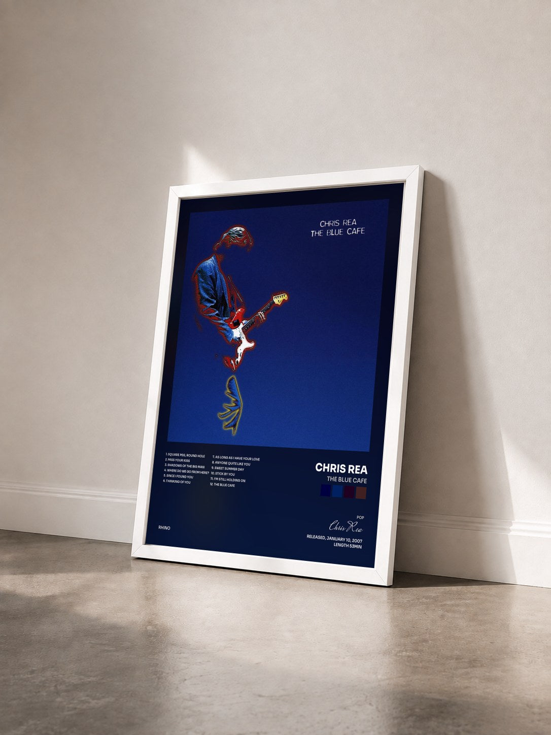 #blanc Tableau de l'album The Blue Cafe de Chris Rea vu de trois quarts, cadre blanc