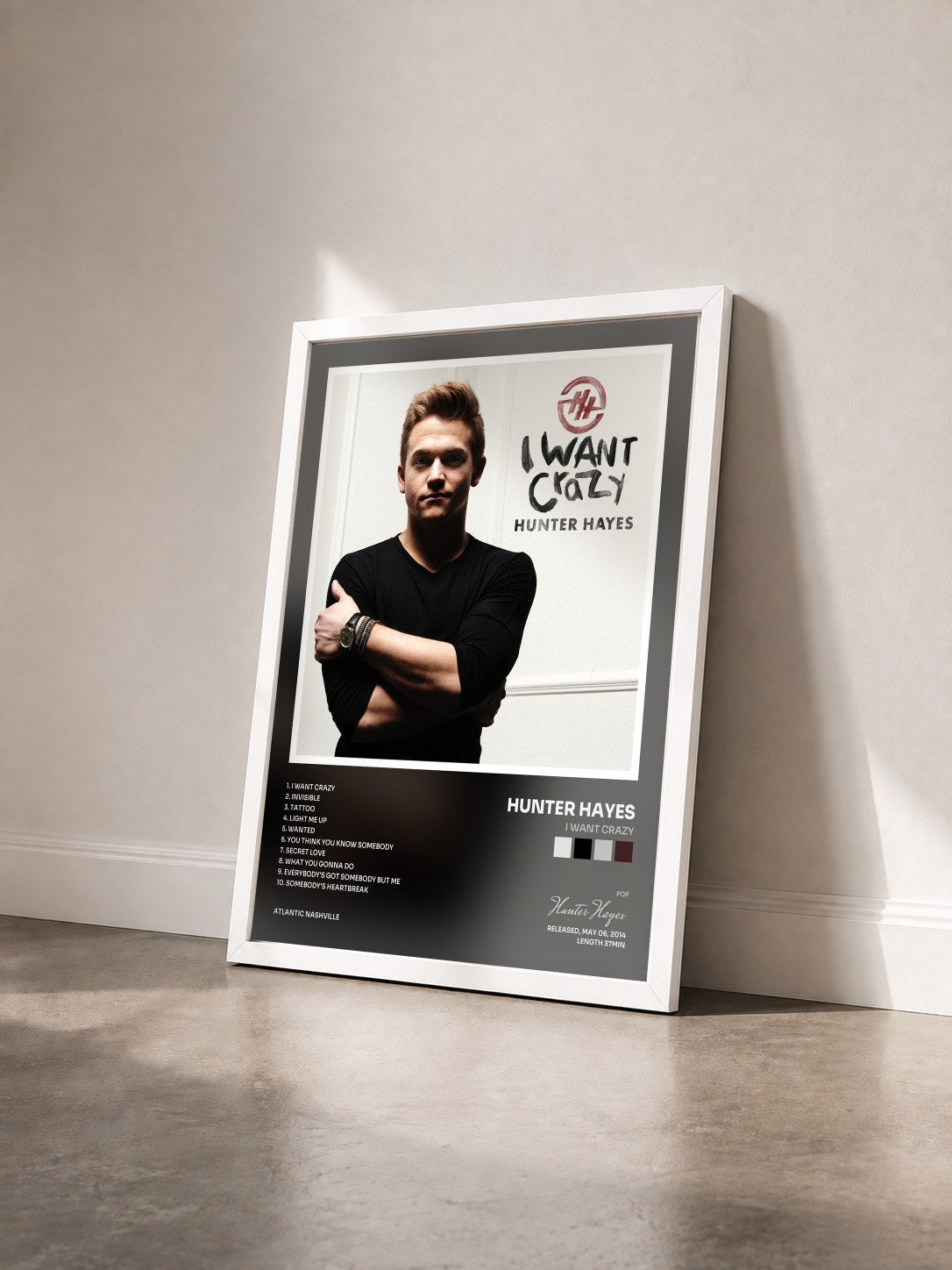 #blanc Tableau de l'album I Want Crazy de Hunter Hayes vu de trois quarts, cadre blanc