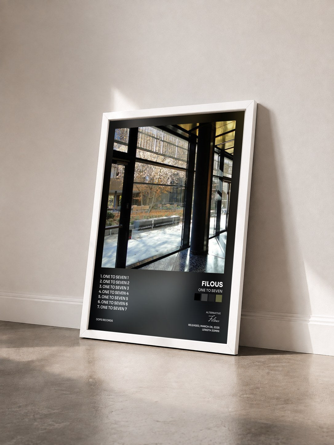 #blanc Tableau de l'album One to Seven de Filous vu de trois quarts, cadre blanc