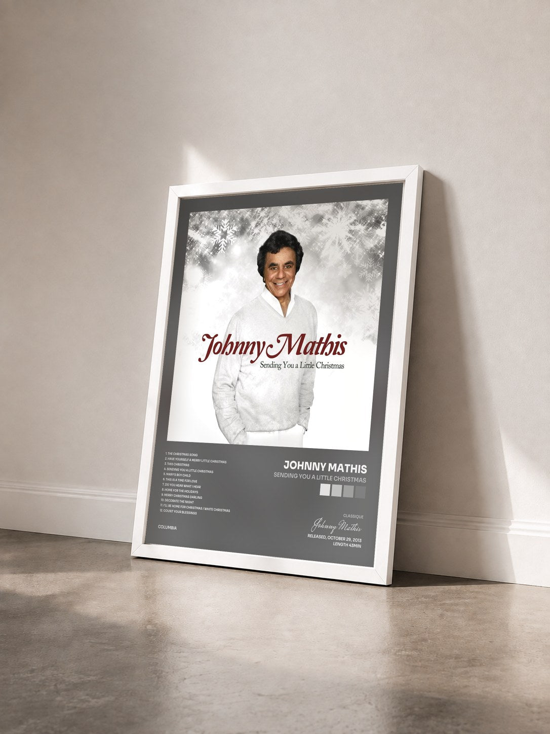 #blanc Tableau de l'album Sending You a Little Christmas de Johnny Mathis vu de trois quarts, cadre blanc