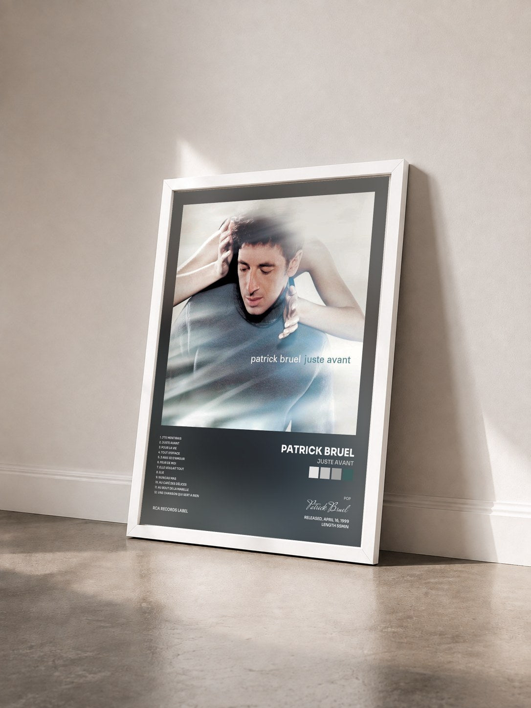 #blanc Tableau de l'album Juste Avant de Patrick Bruel vu de trois quarts, cadre blanc
