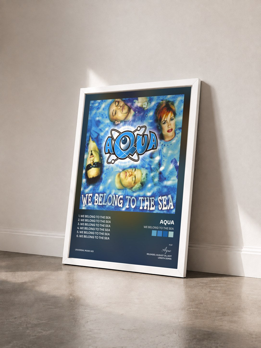 #blanc Tableau de l'album We Belong To The Sea de Aqua vu de trois quarts, cadre blanc