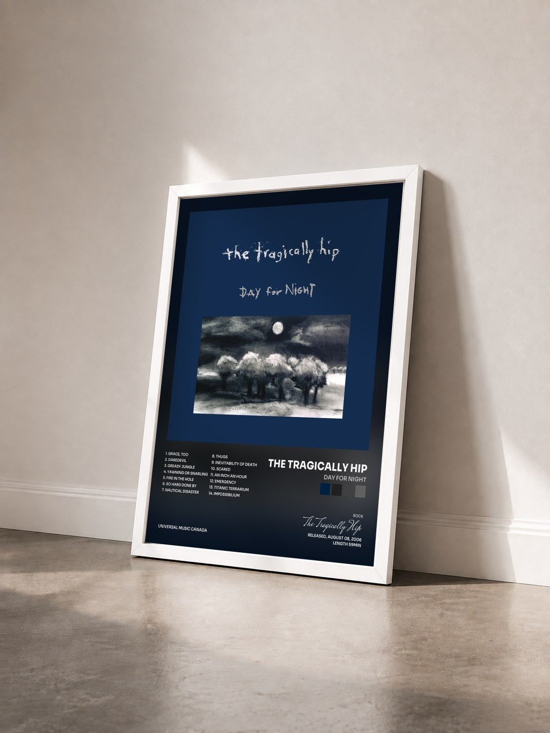 #blanc Tableau de l'album Day For Night de The Tragically Hip vu de trois quarts, cadre blanc