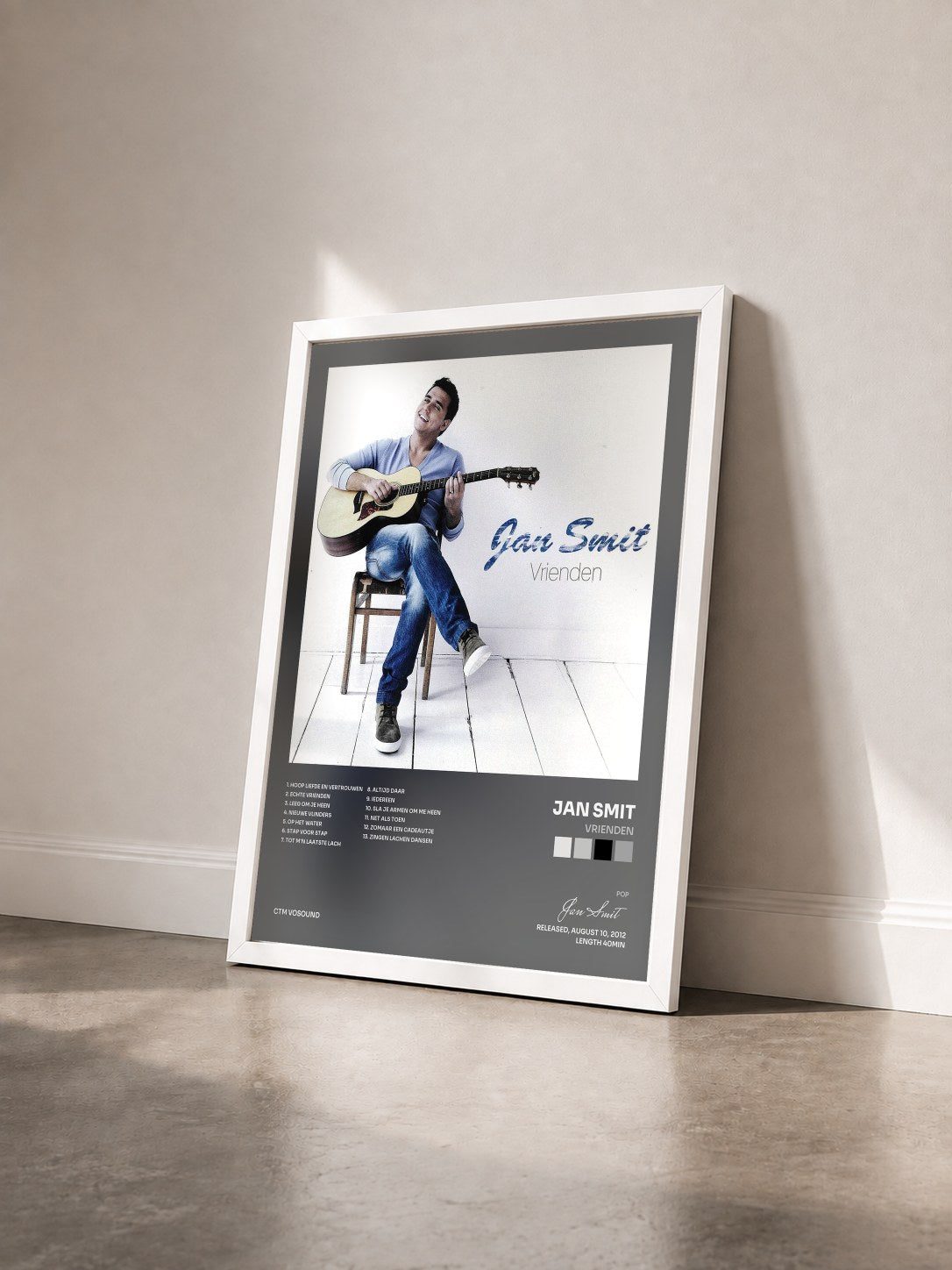 #blanc Tableau de l'album Vrienden de Jan Smit vu de trois quarts, cadre blanc