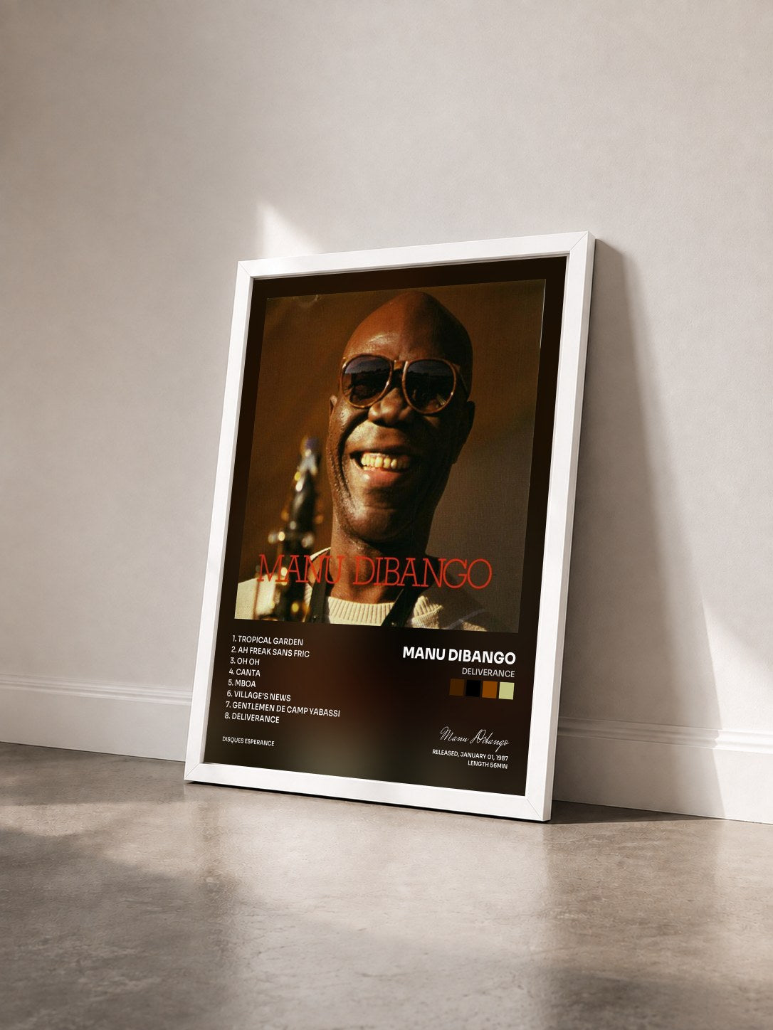 #blanc Tableau de l'album Deliverance de Manu Dibango vu de trois quarts, cadre blanc