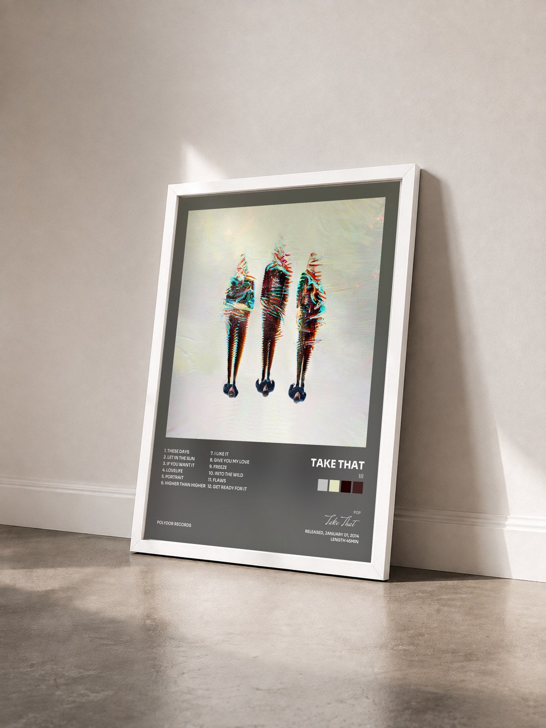 #blanc Tableau de l'album III de Take That vu de trois quarts, cadre blanc