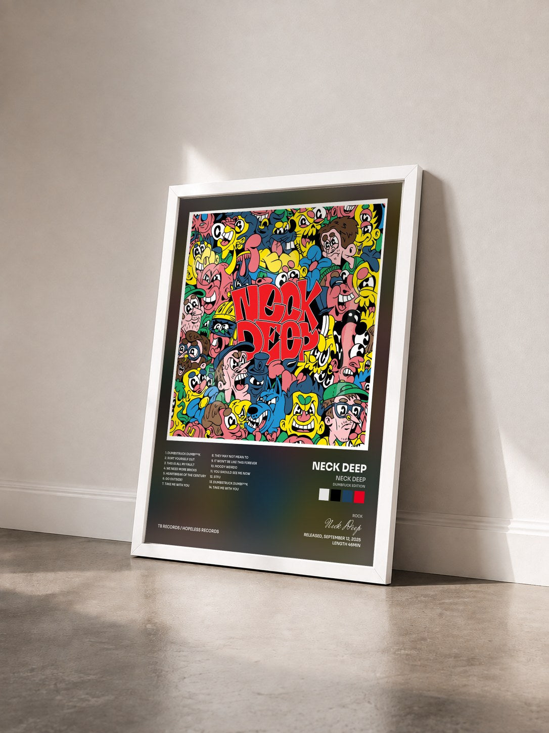 #blanc Tableau de l'album Neck Deep (Dumbfuck Edition) de Neck Deep vu de trois quarts, cadre blanc