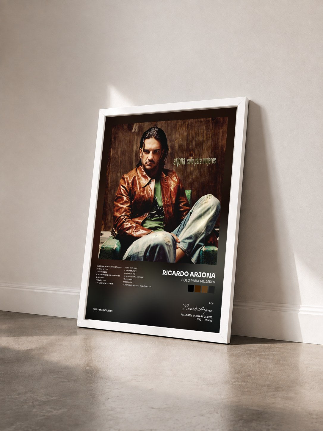 #blanc Tableau de l'album Sólo Para Mujeres de Ricardo Arjona vu de trois quarts, cadre blanc