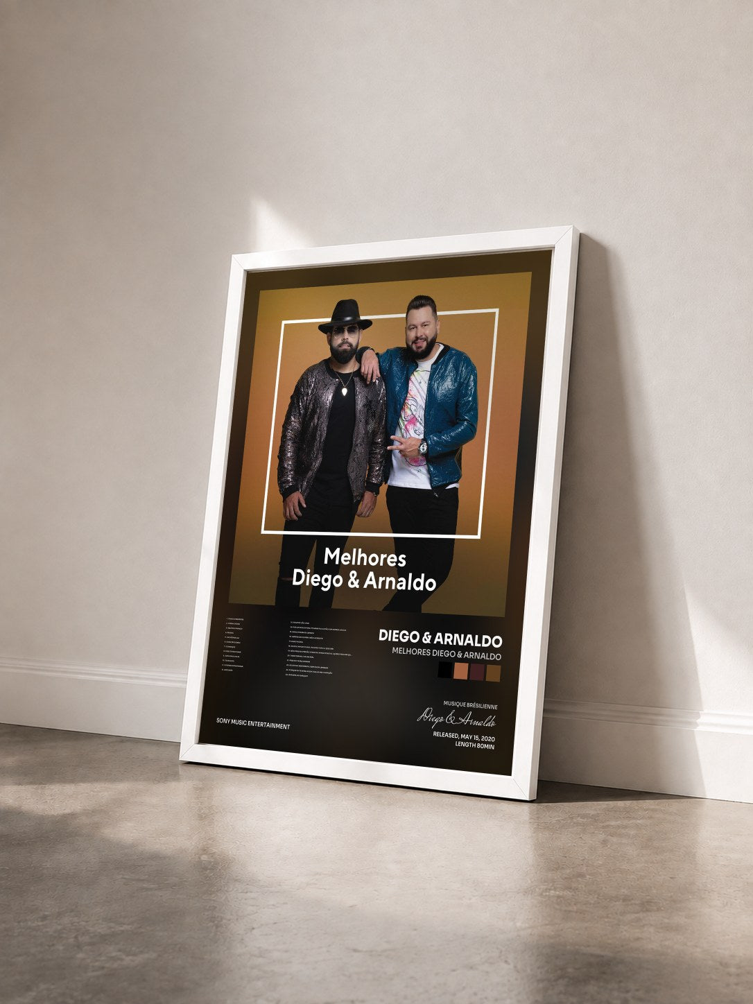 #blanc Tableau de l'album Melhores Diego & Arnaldo de Diego & Arnaldo vu de trois quarts, cadre blanc