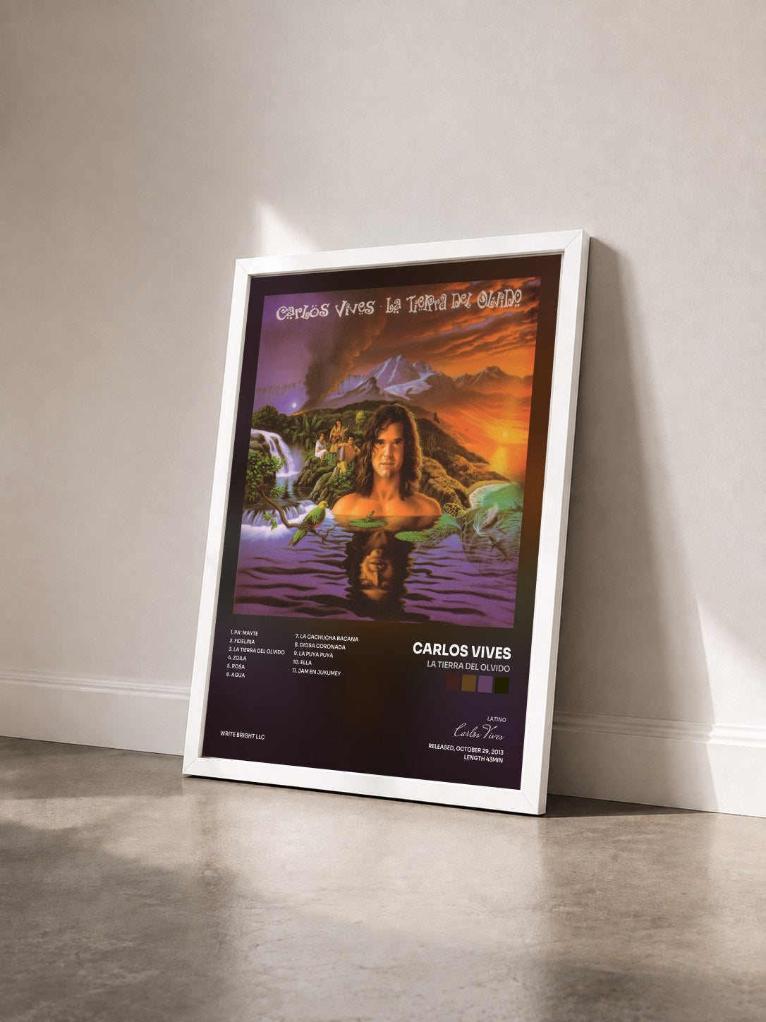 #blanc Tableau de l'album La Tierra del Olvido de Carlos Vives vu de trois quarts, cadre blanc