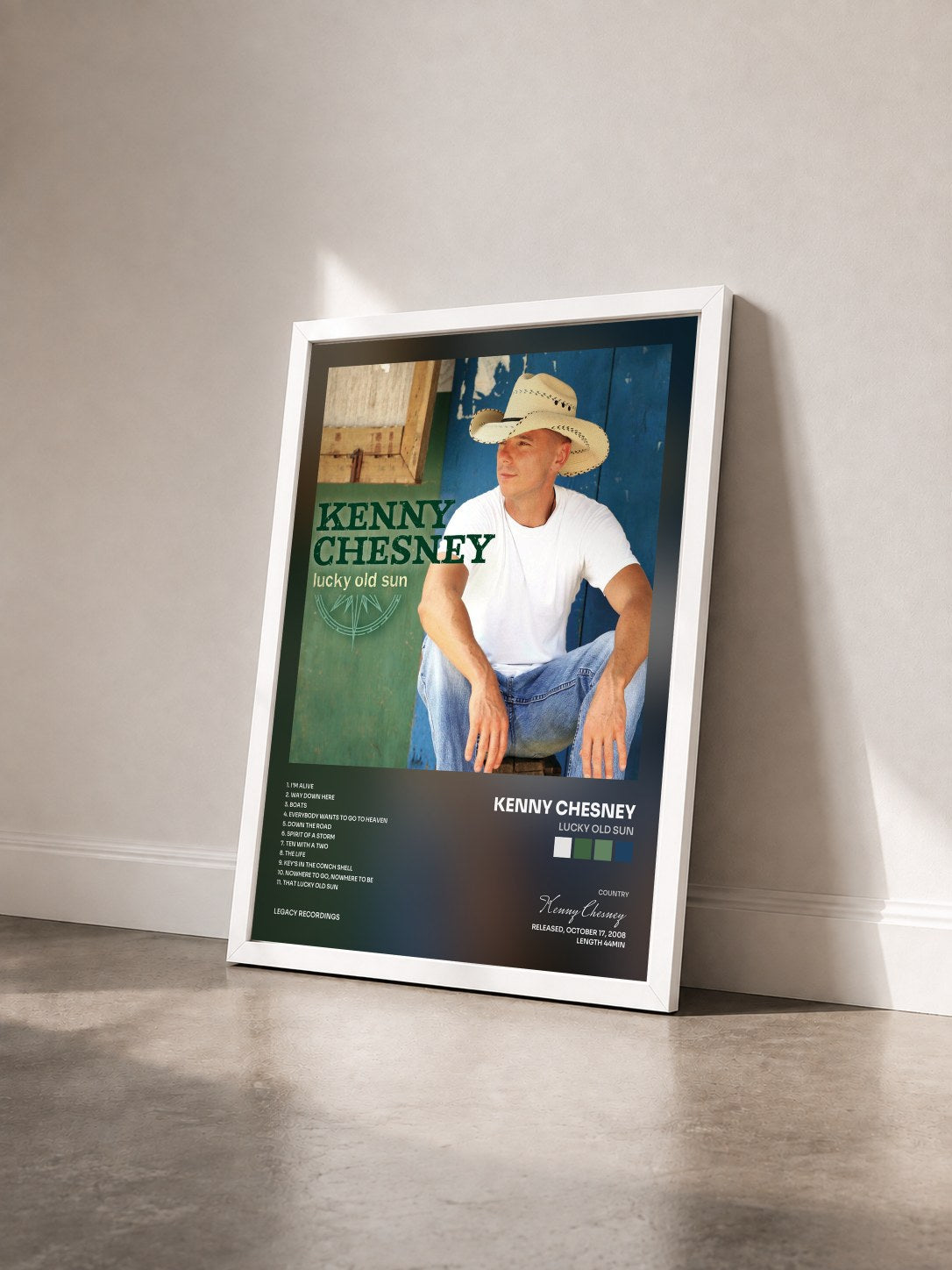 #blanc Tableau de l'album Lucky Old Sun de Kenny Chesney vu de trois quarts, cadre blanc
