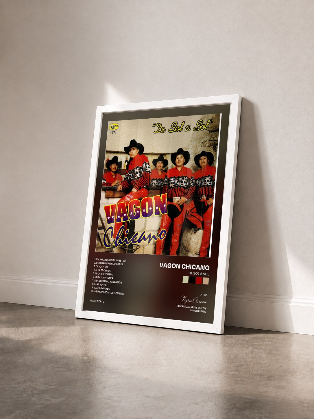 #blanc Tableau de l'album De Sol a Sol de Vagon Chicano vu de trois quarts, cadre blanc