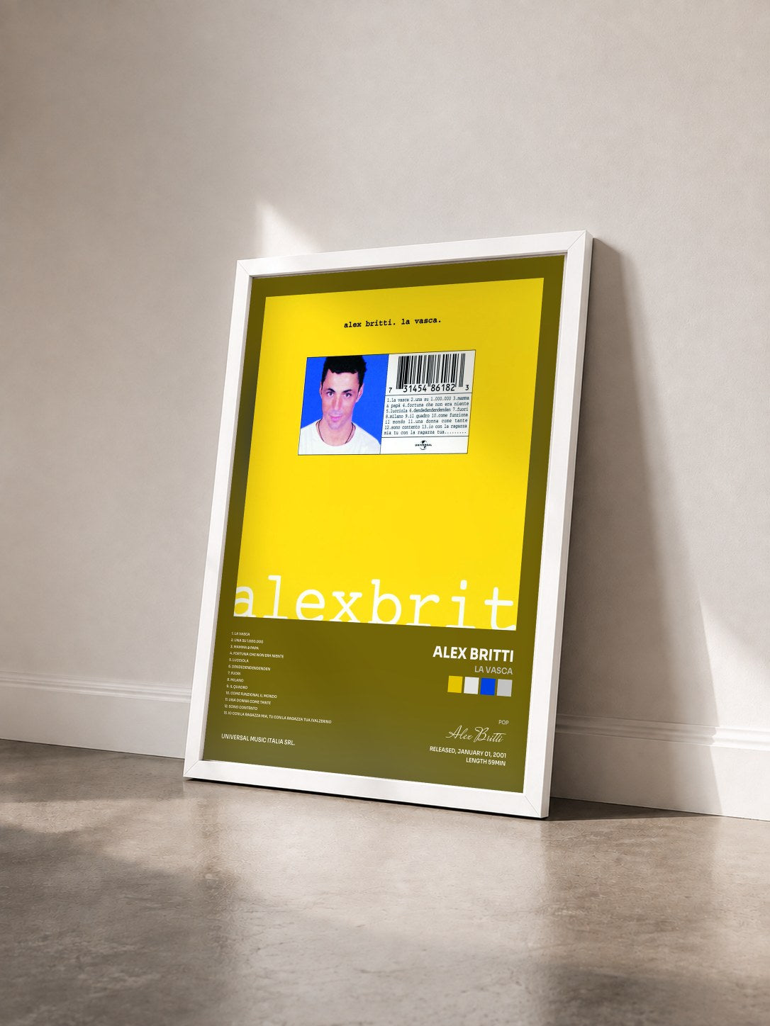 #blanc Tableau de l'album La Vasca de Alex Britti vu de trois quarts, cadre blanc