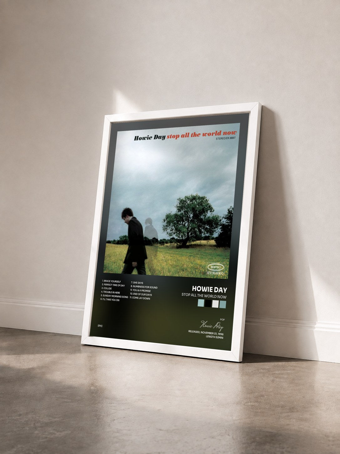 #blanc Tableau de l'album Stop All The World Now de Howie Day vu de trois quarts, cadre blanc