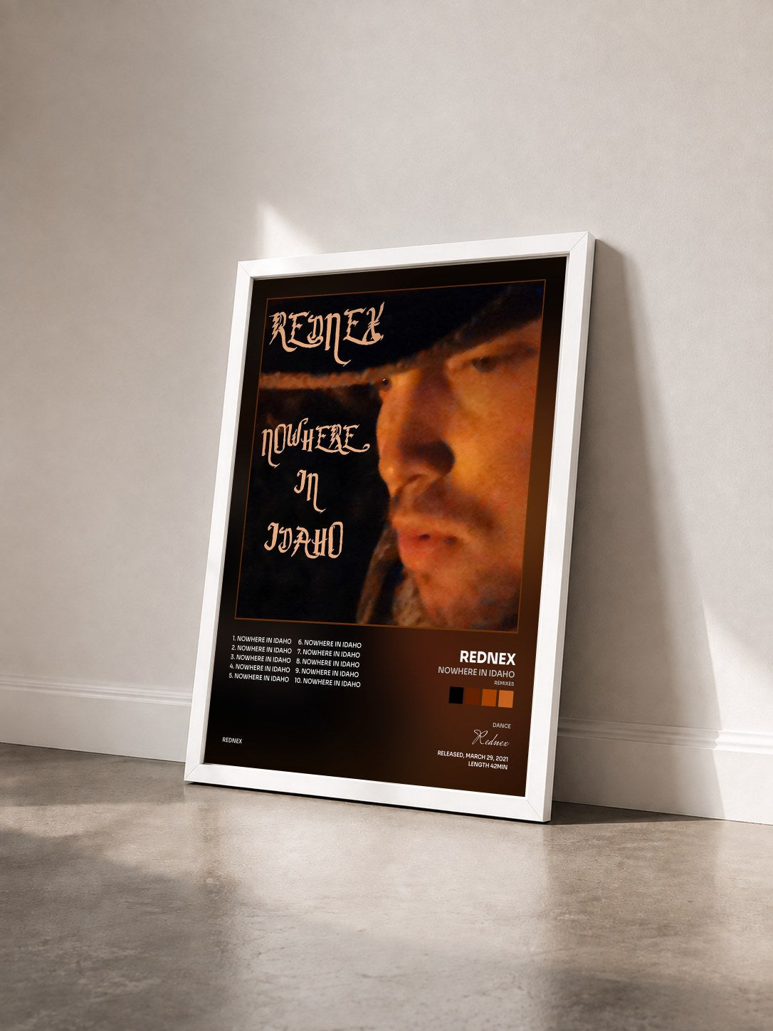 #blanc Tableau de l'album Nowhere in Idaho (Remixes) de Rednex vu de trois quarts, cadre blanc