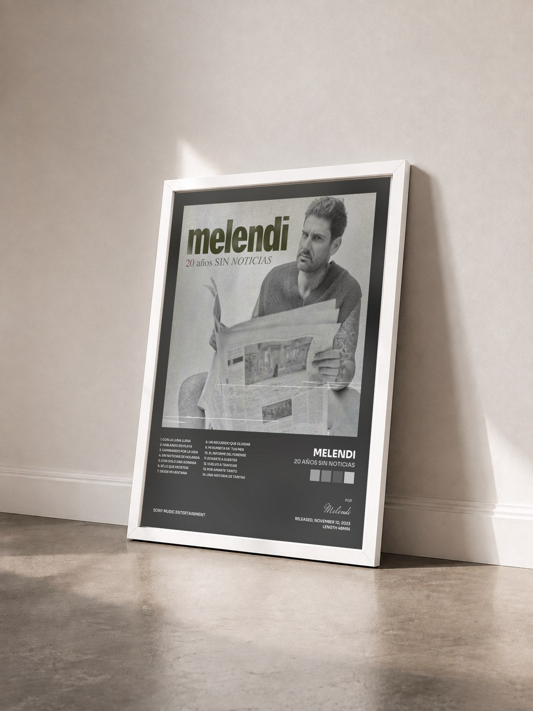 #blanc Tableau de l'album 20 Años Sin Noticias de Melendi vu de trois quarts, cadre blanc