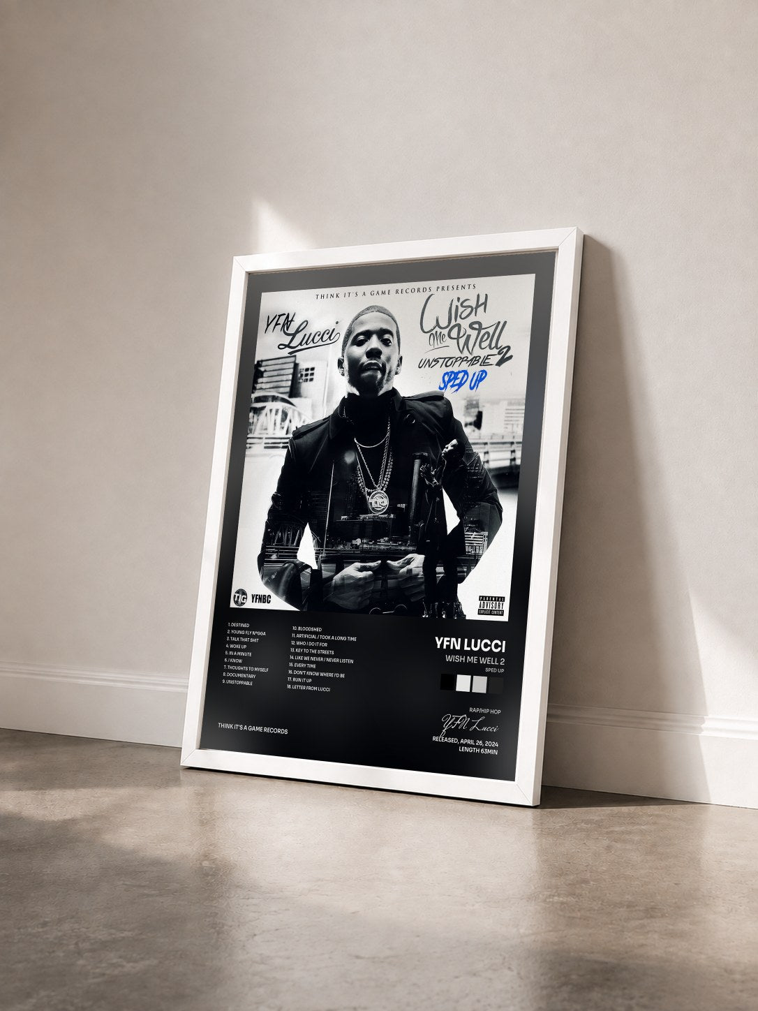 #blanc Tableau de l'album Wish Me Well 2 (Sped Up) de YFN Lucci vu de trois quarts, cadre blanc