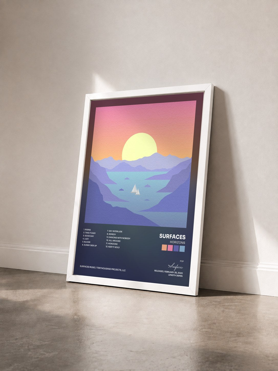 #blanc Tableau de l'album Horizons de Surfaces vu de trois quarts, cadre blanc
