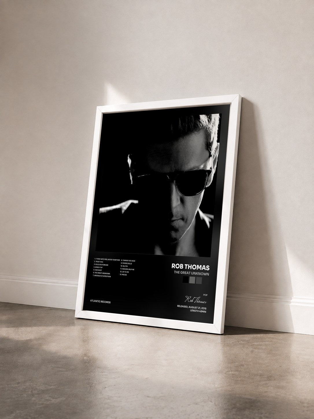 #blanc Tableau de l'album The Great Unknown de Rob Thomas vu de trois quarts, cadre blanc