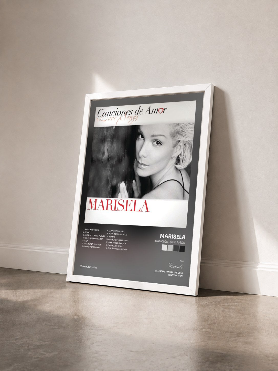 #blanc Tableau de l'album Canciones De Amor de Marisela vu de trois quarts, cadre blanc