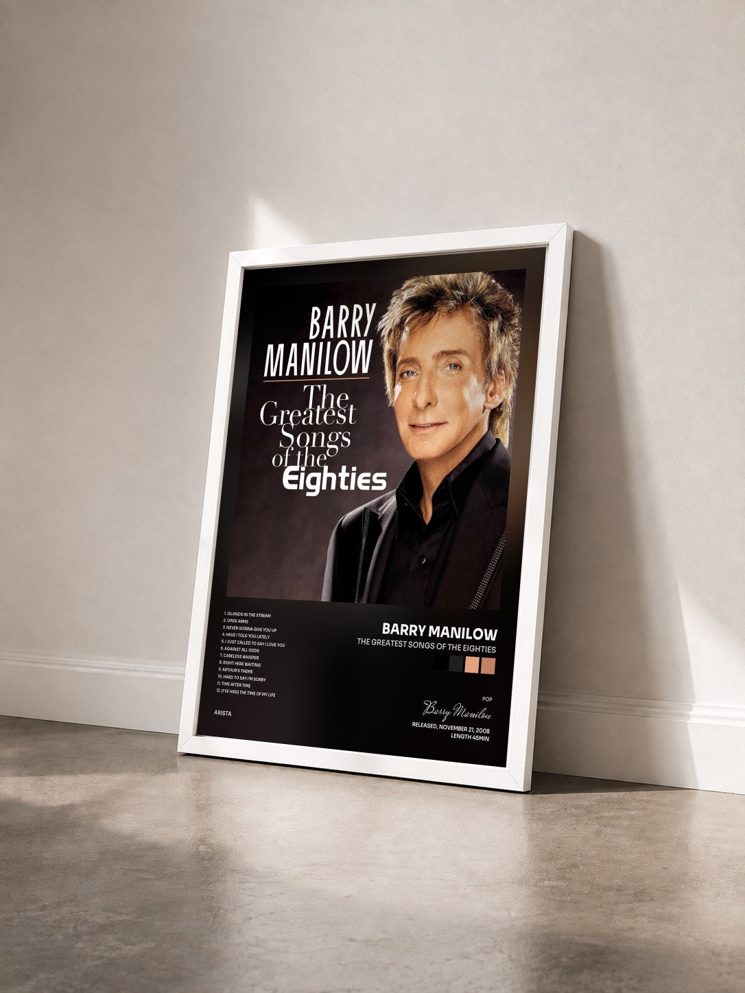 #blanc Tableau de l'album The Greatest Songs Of The Eighties de Barry Manilow vu de trois quarts, cadre blanc
