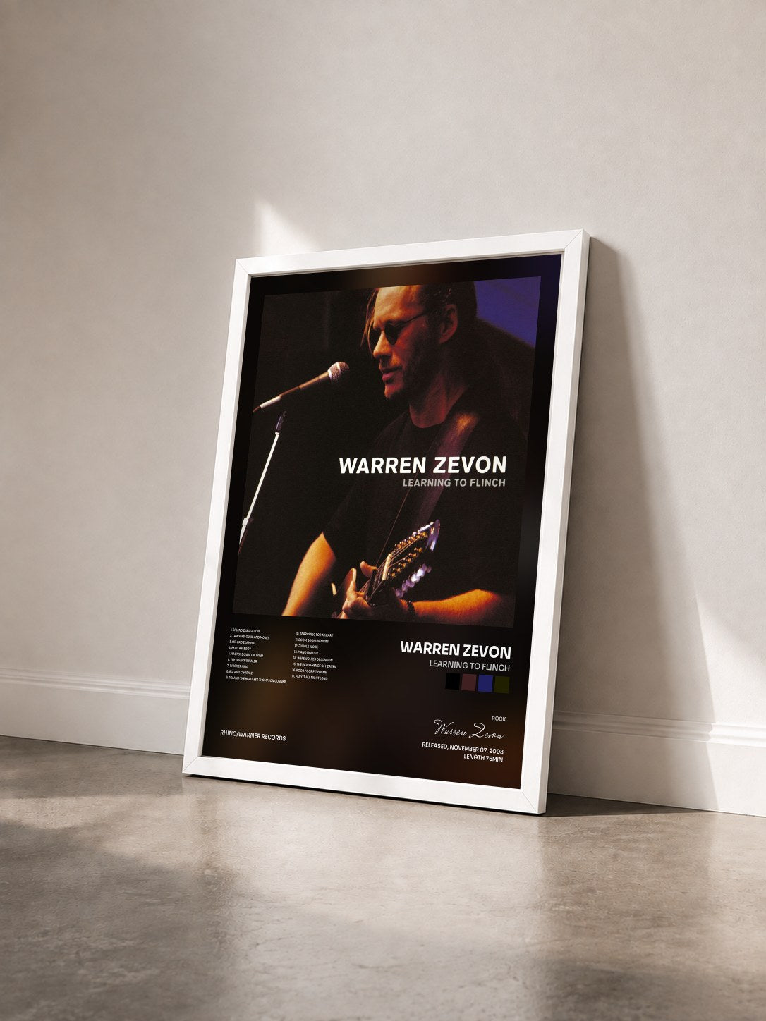 #blanc Tableau de l'album Learning to Flinch de Warren Zevon vu de trois quarts, cadre blanc