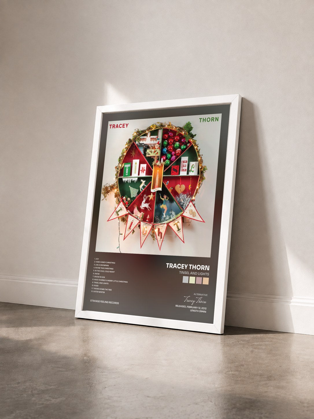 #blanc Tableau de l'album Tinsel and Lights de Tracey Thorn vu de trois quarts, cadre blanc