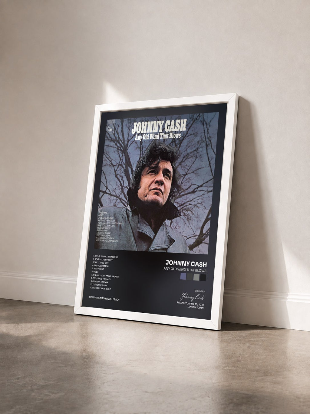 #blanc Tableau de l'album Any Old Wind That Blows de Johnny Cash vu de trois quarts, cadre blanc