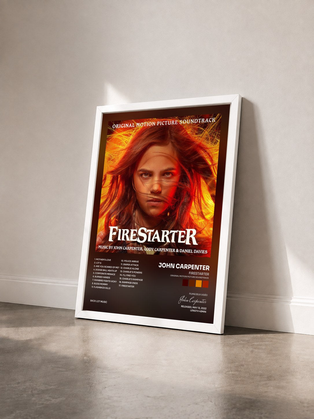 #blanc Tableau de l'album Firestarter (Original Motion Picture Soundtrack) de John Carpenter vu de trois quarts, cadre blanc