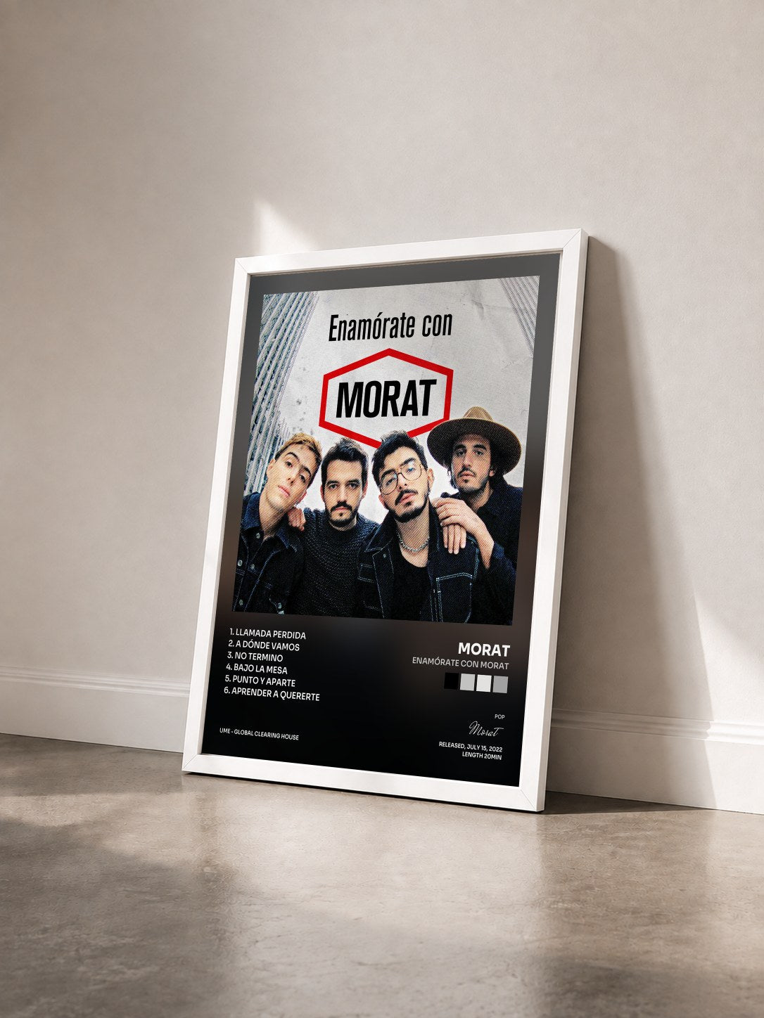 #blanc Tableau de l'album Enamórate con MORAT de Morat vu de trois quarts, cadre blanc