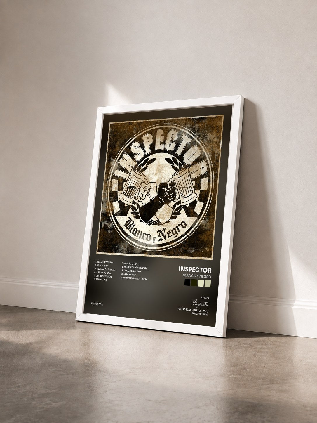 #blanc Tableau de l'album Blanco y Negro de Inspector vu de trois quarts, cadre blanc