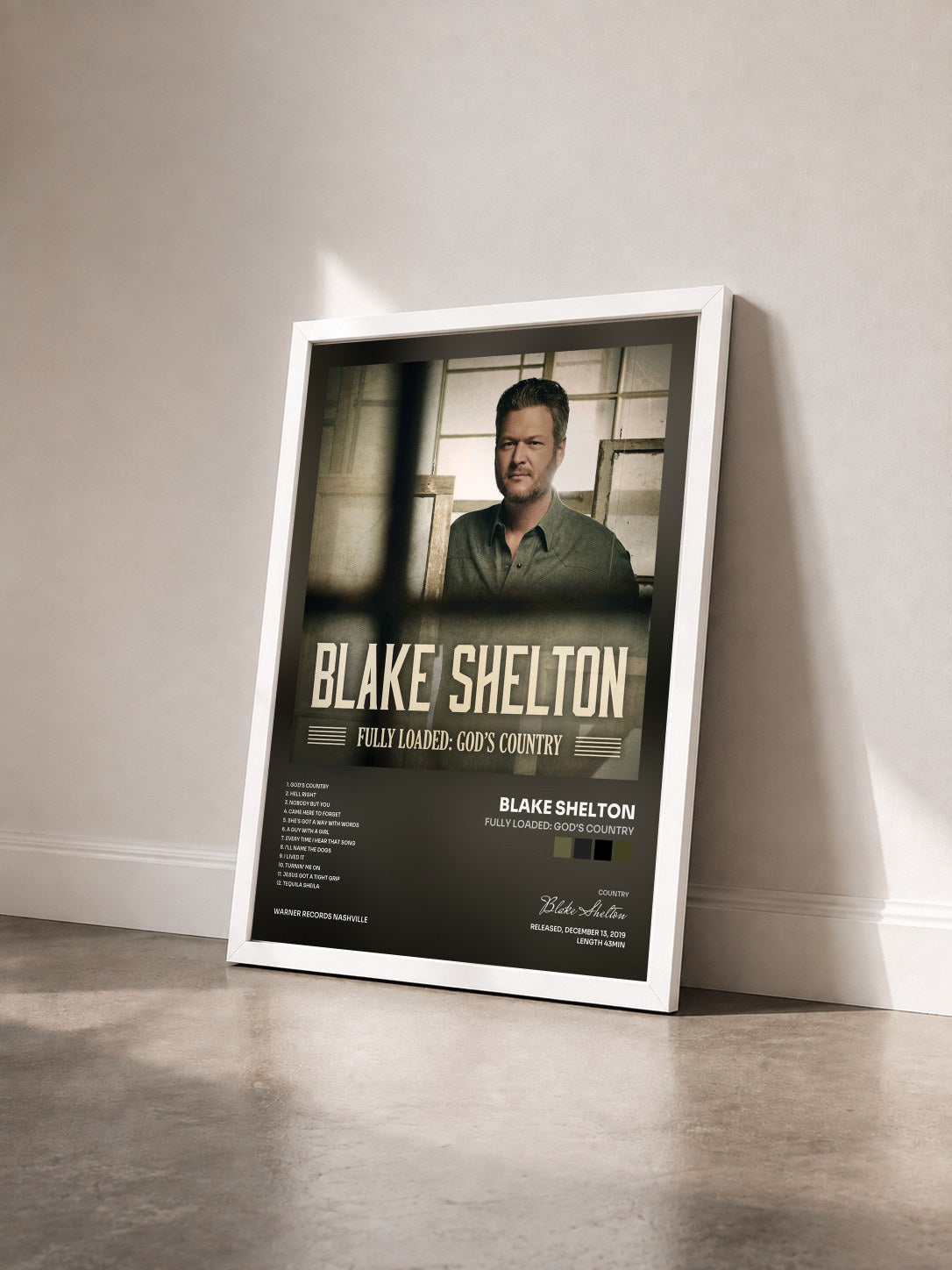 #blanc Tableau de l'album Fully Loaded: God's Country de Blake Shelton vu de trois quarts, cadre blanc