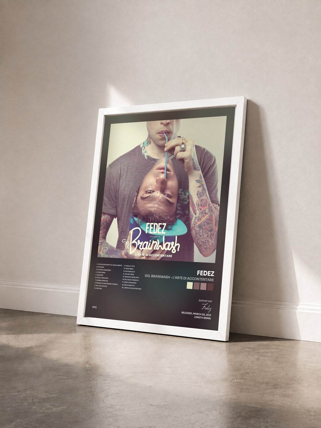#blanc Tableau de l'album Sig. Brainwash - L'arte di accontentare de Fedez vu de trois quarts, cadre blanc