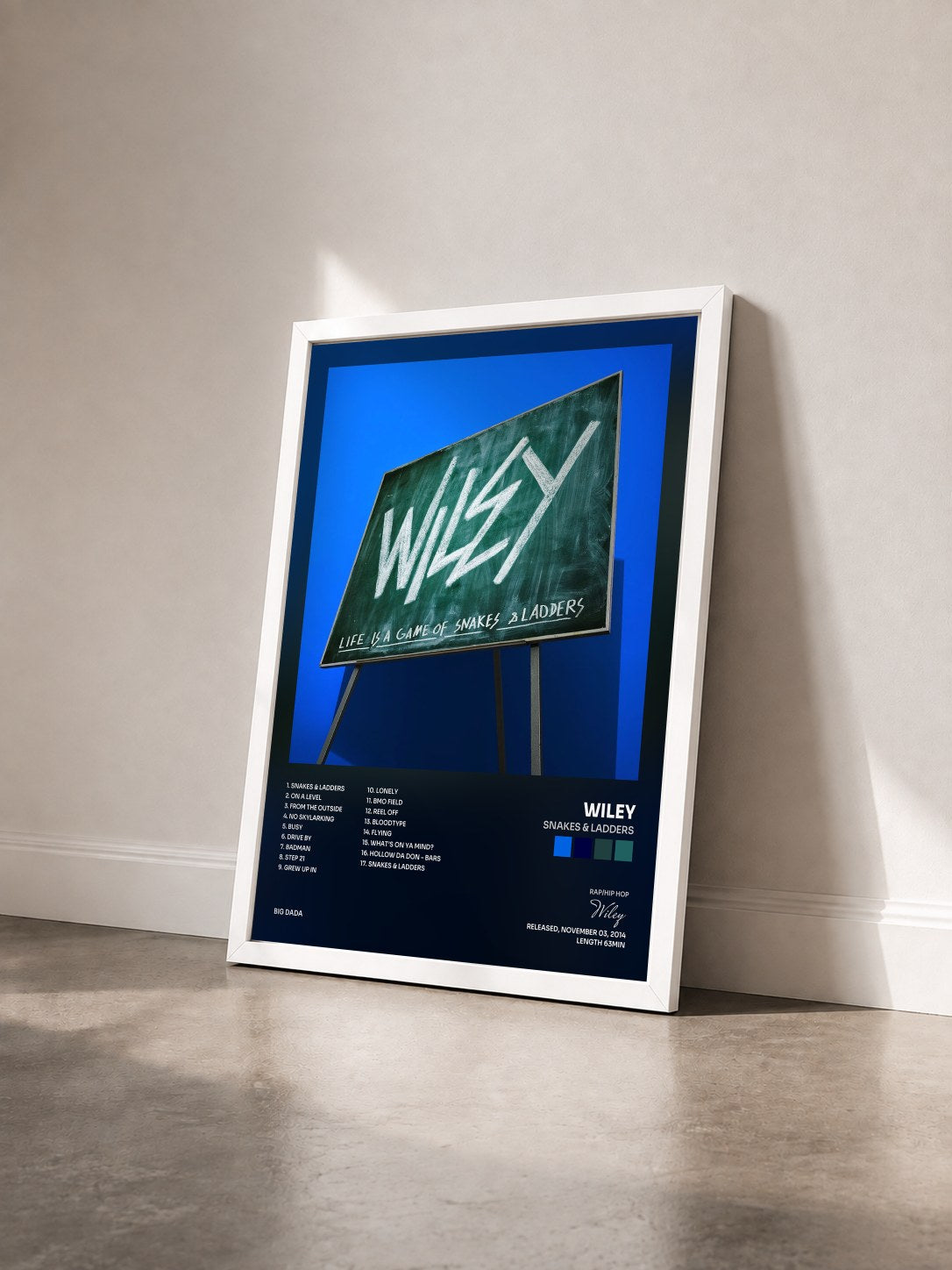 #blanc Tableau de l'album Snakes & Ladders de Wiley vu de trois quarts, cadre blanc