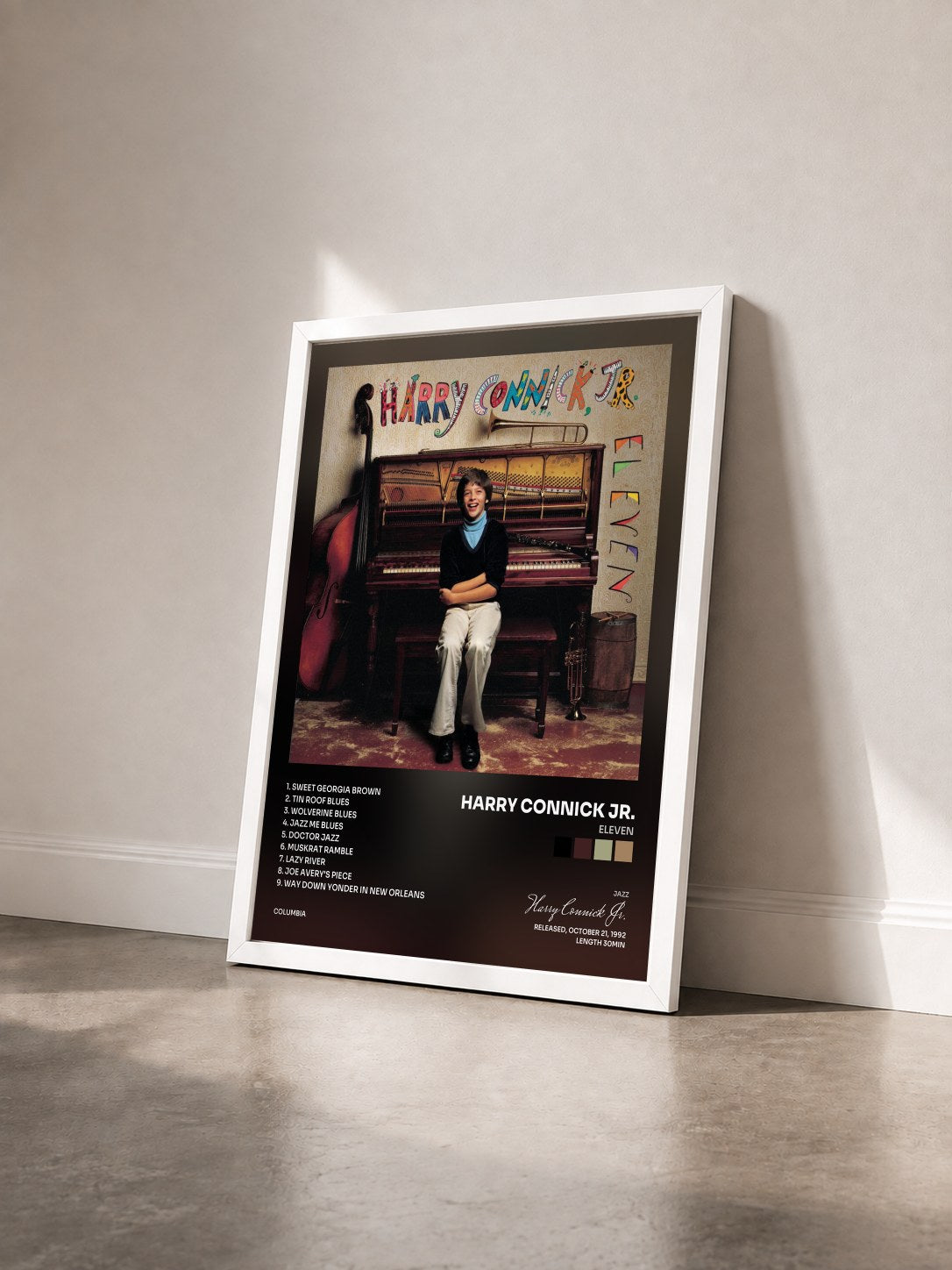 #blanc Tableau de l'album Eleven de Harry Connick Jr. vu de trois quarts, cadre blanc
