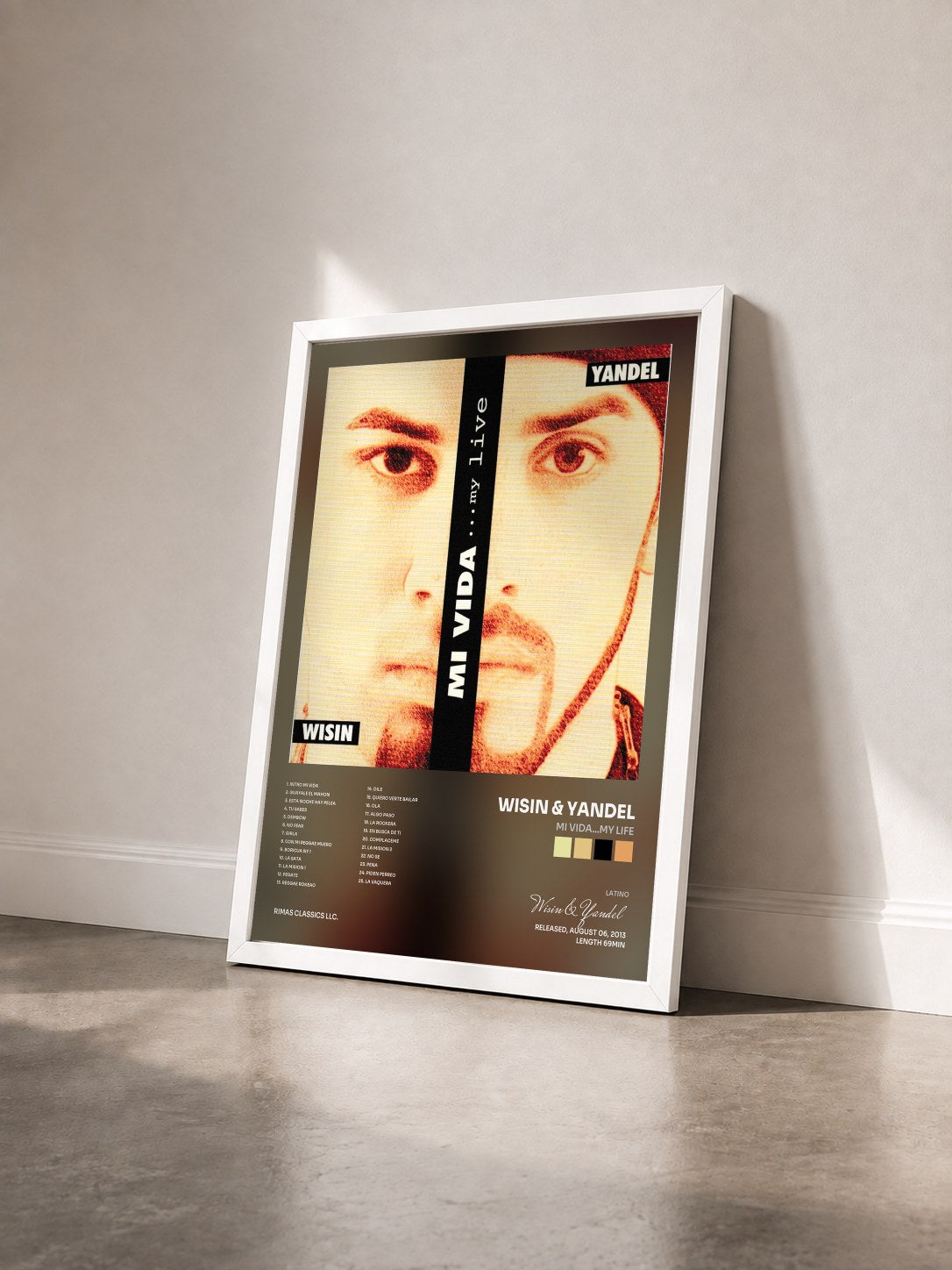 #blanc Tableau de l'album Mi Vida…my Life de Wisin & Yandel vu de trois quarts, cadre blanc