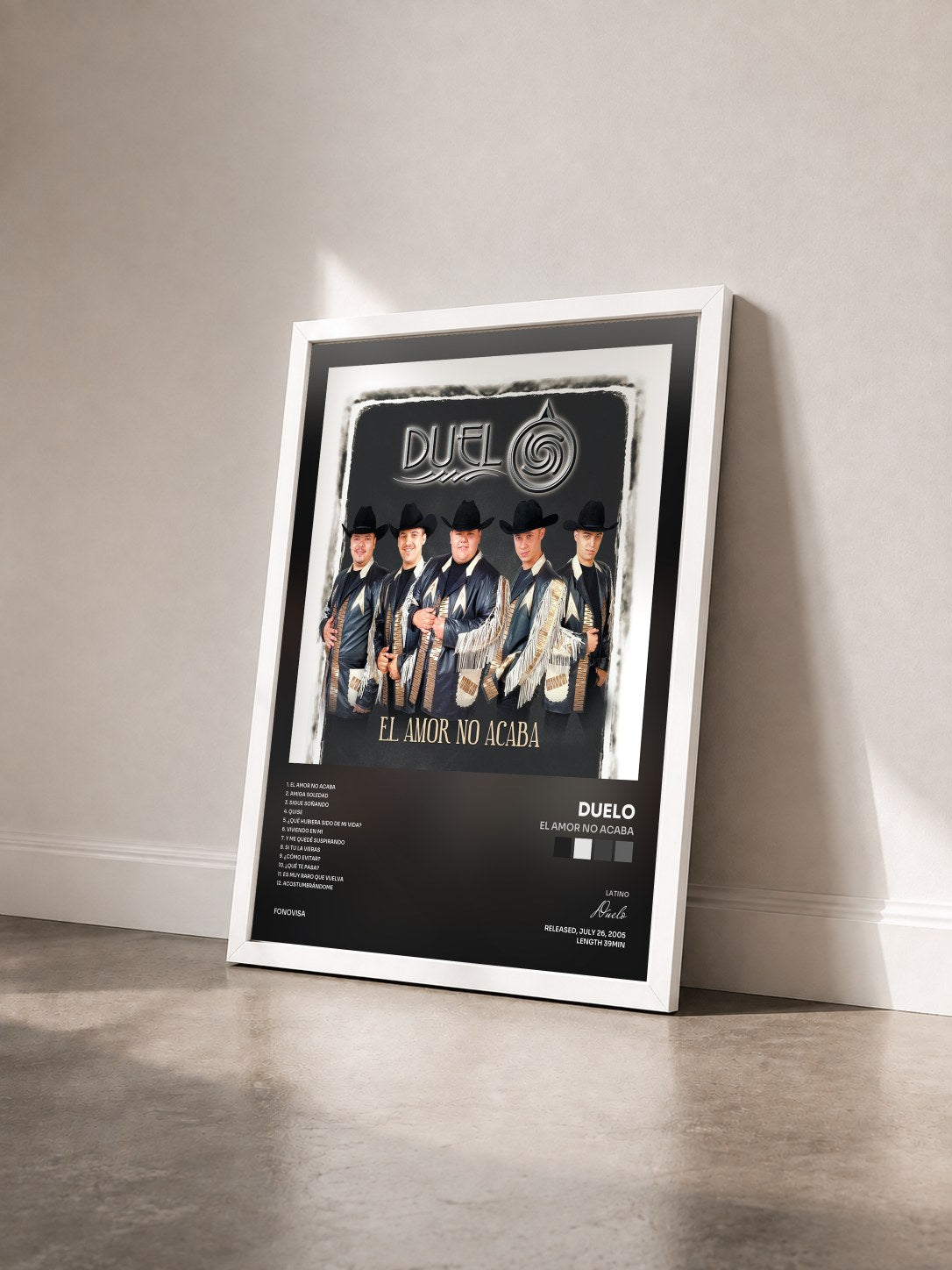 #blanc Tableau de l'album El Amor No Acaba de Duelo vu de trois quarts, cadre blanc