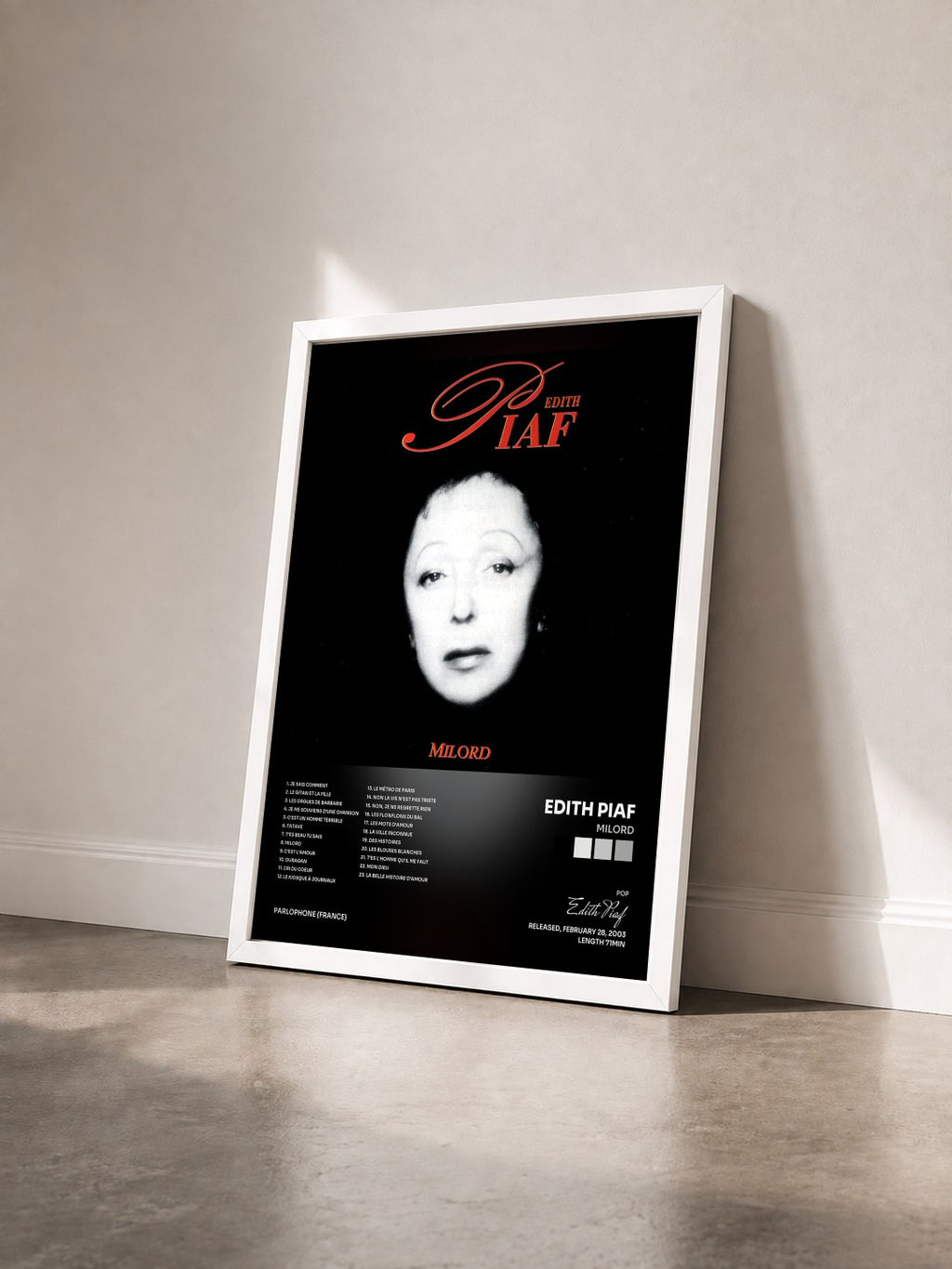 #blanc Tableau de l'album milord de Edith Piaf vu de trois quarts, cadre blanc