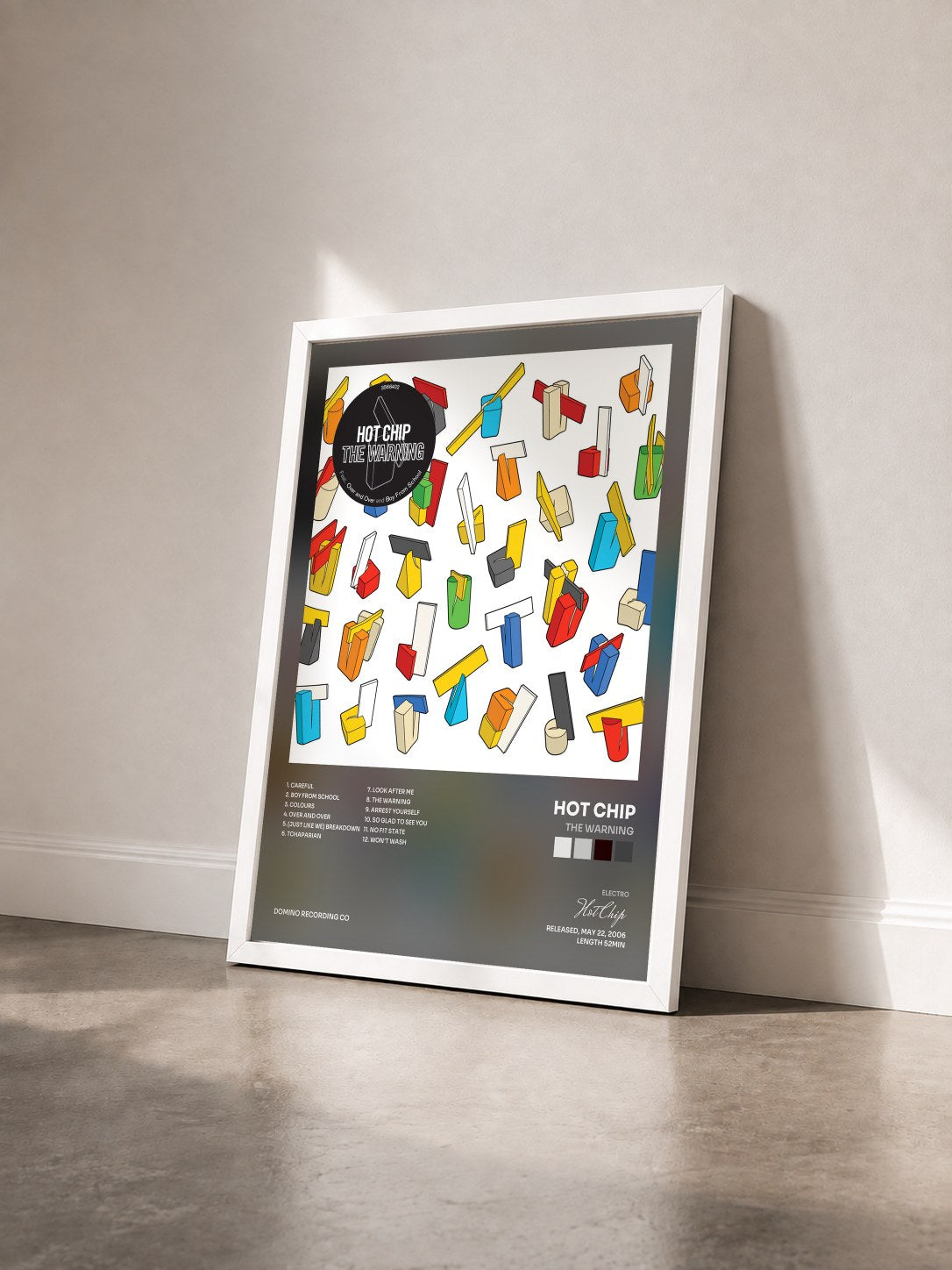 #blanc Tableau de l'album The Warning de Hot Chip vu de trois quarts, cadre blanc