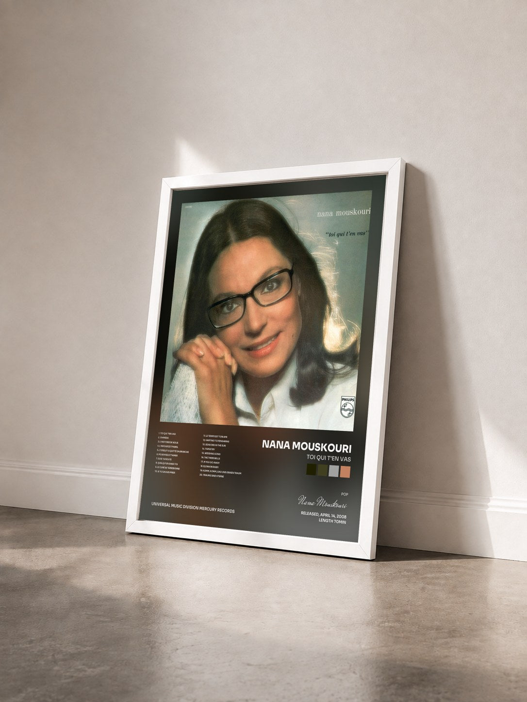 #blanc Tableau de l'album Toi Qui T'En Vas de Nana Mouskouri vu de trois quarts, cadre blanc