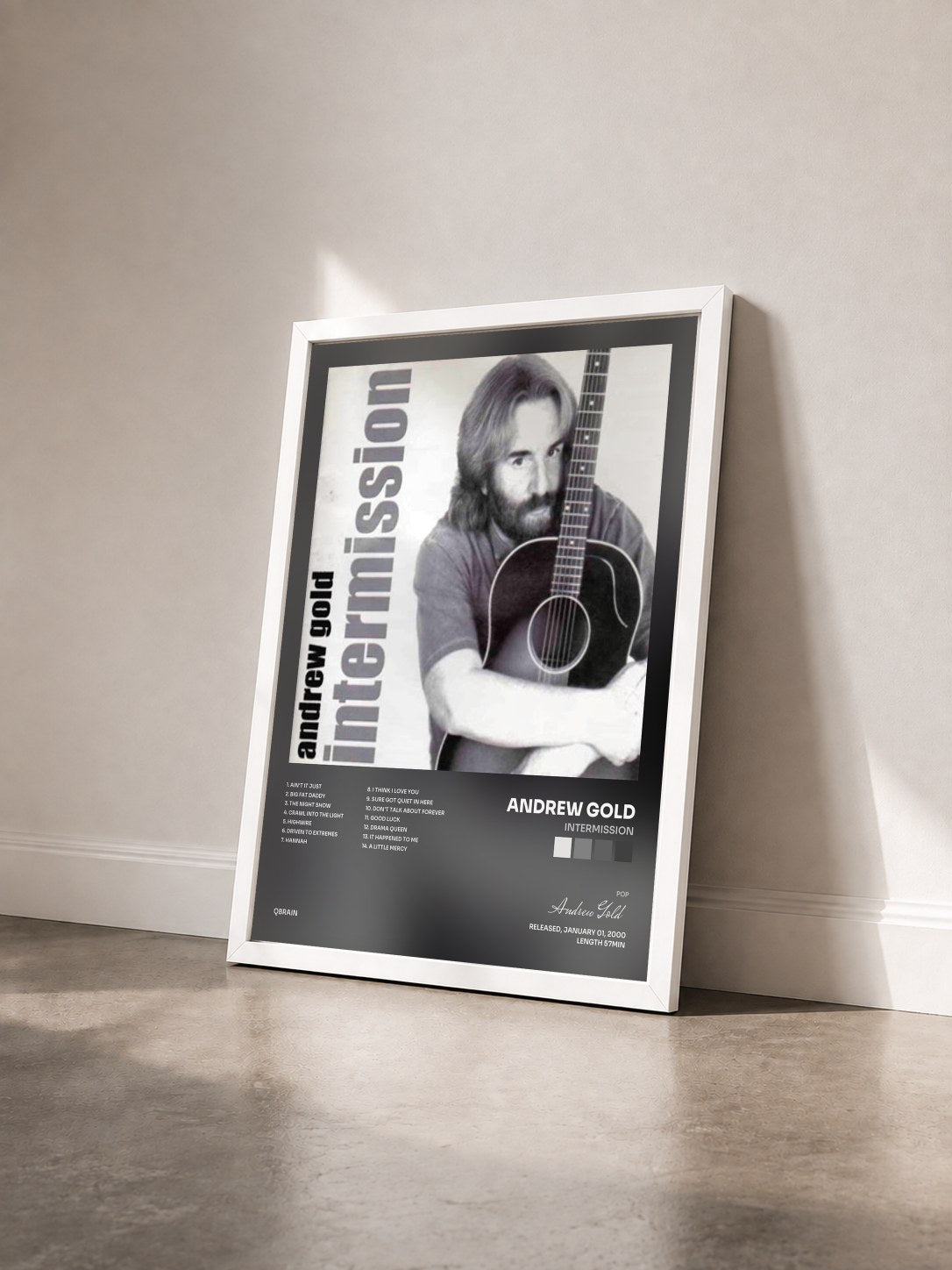 #blanc Tableau de l'album Intermission de Andrew Gold vu de trois quarts, cadre blanc