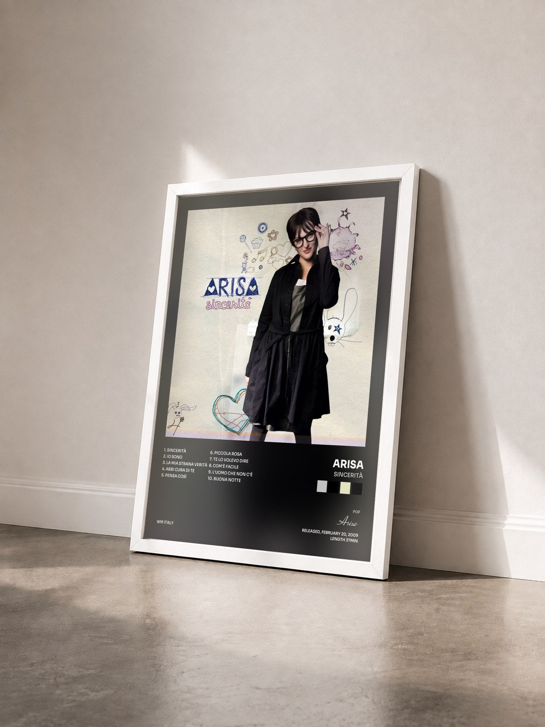 #blanc Tableau de l'album Sincerità de Arisa vu de trois quarts, cadre blanc