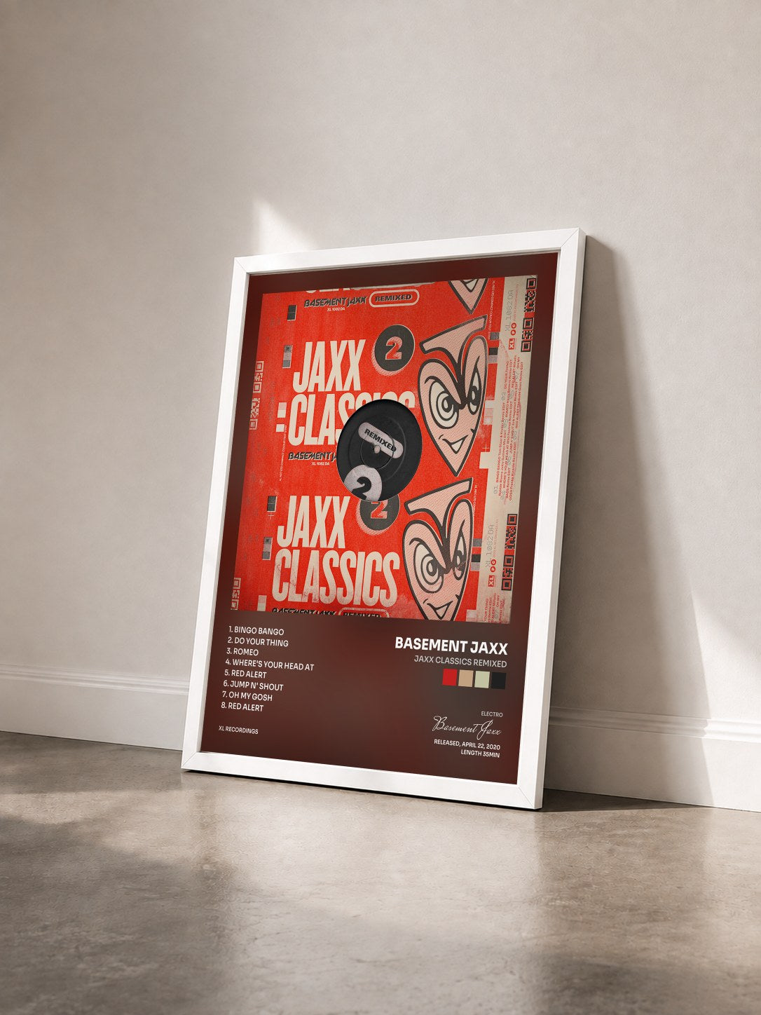 #blanc Tableau de l'album Jaxx Classics Remixed de Basement Jaxx vu de trois quarts, cadre blanc