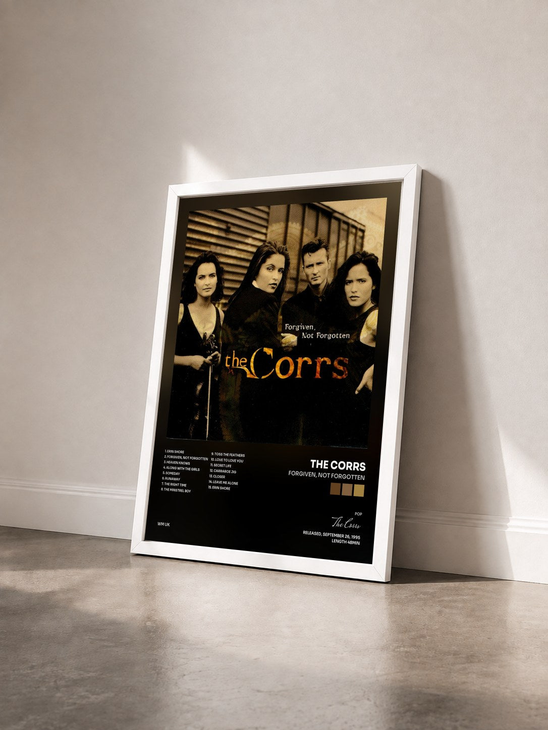#blanc Tableau de l'album Forgiven, Not Forgotten de The Corrs vu de trois quarts, cadre blanc