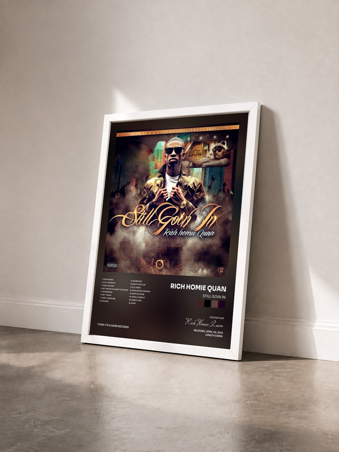 #blanc Tableau de l'album Still Goin In de Rich Homie Quan vu de trois quarts, cadre blanc
