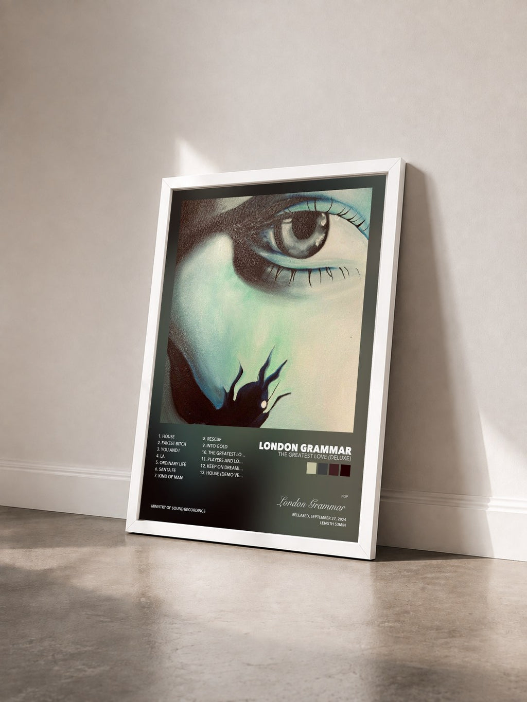 #blanc The Greatest Love (Deluxe) by London Grammar as a framed art print seen at an angle, white frame