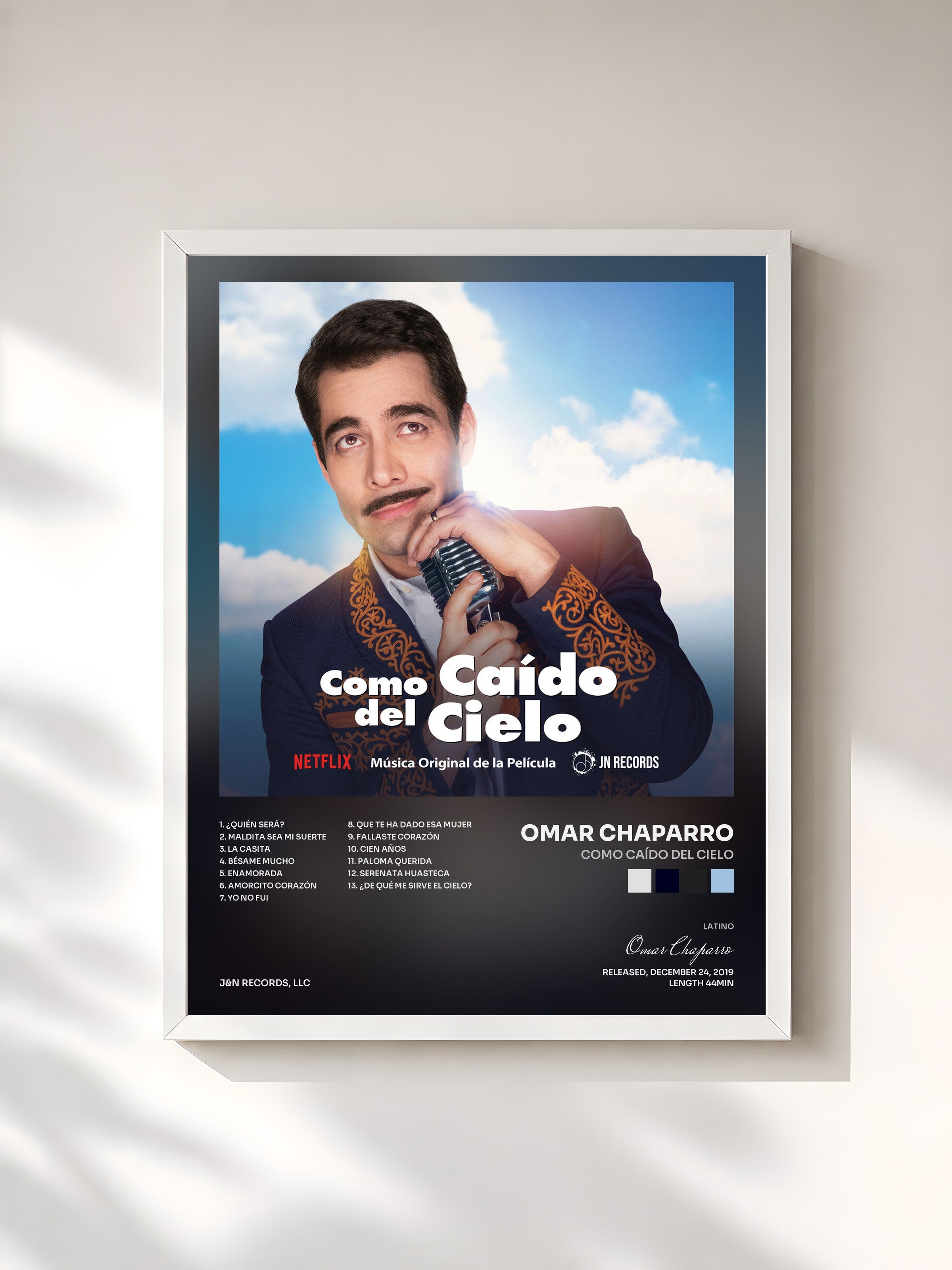 #blanc Tableau de l'album Como Caído del Cielo de Omar Chaparro, cadre blanc, imprimé et encadré en France